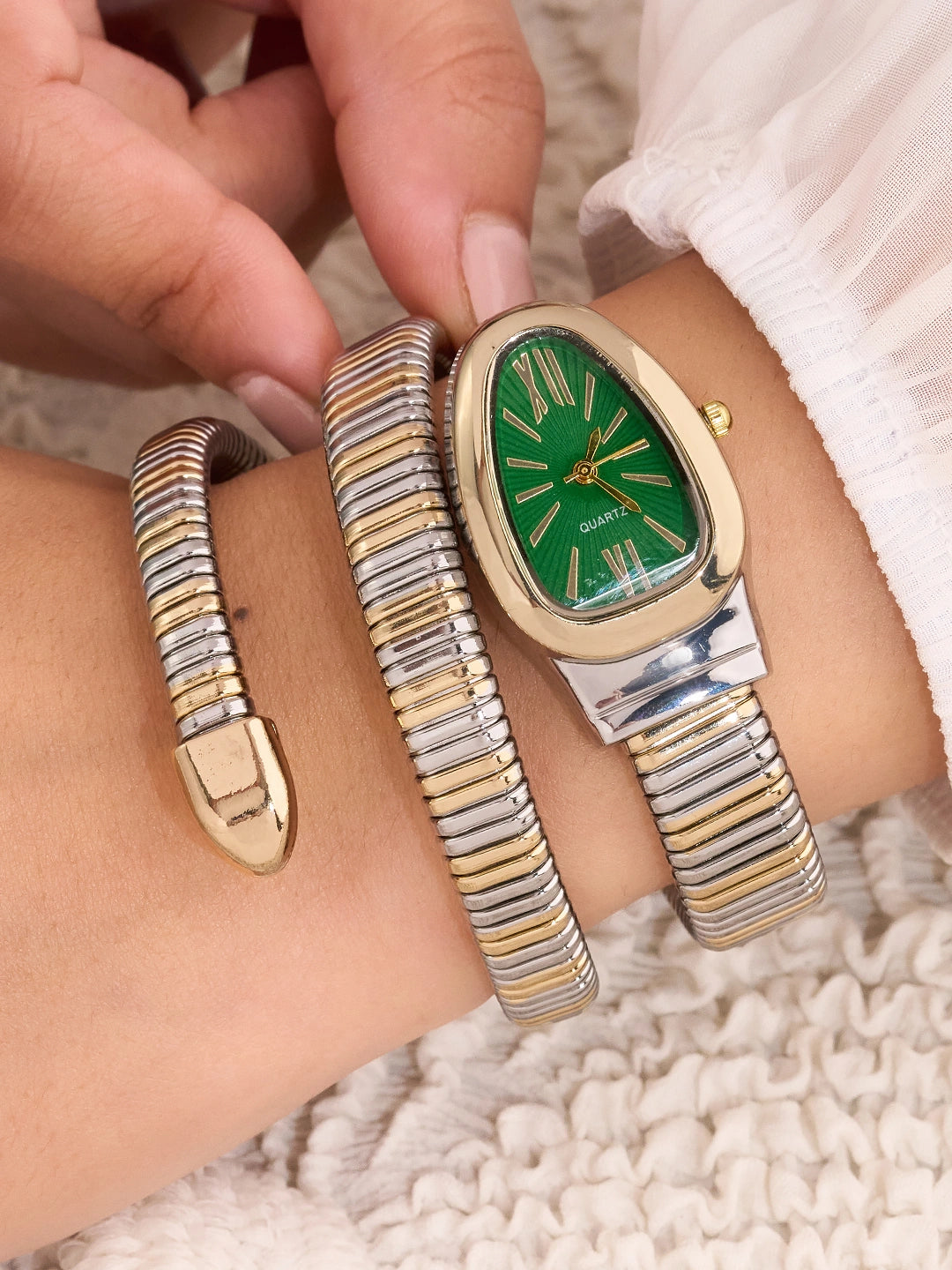 Elara Emerald Two-Tone Oval Women’s Watch